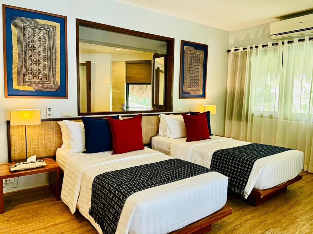 Amun Ini Beach Resort&Spa Anda  Exterior foto