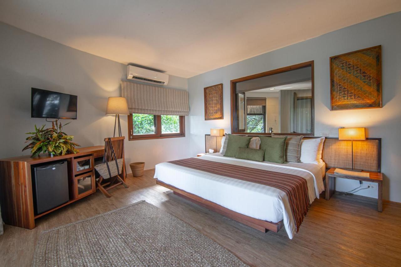 Amun Ini Beach Resort&Spa Anda  Exterior foto