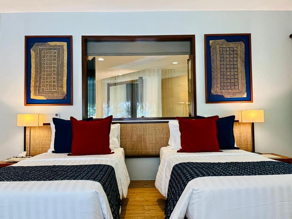 Amun Ini Beach Resort&Spa Anda  Exterior foto