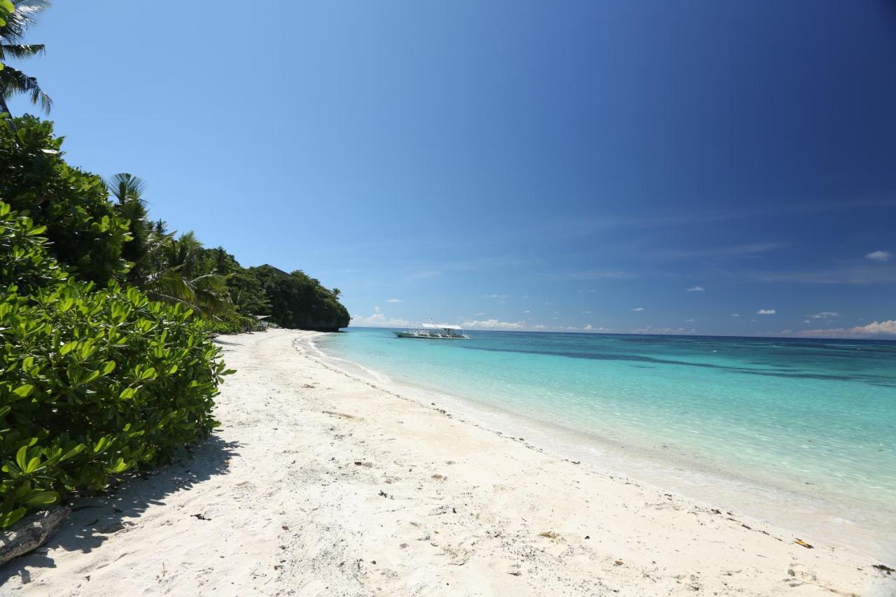 Amun Ini Beach Resort&Spa Anda  Exterior foto