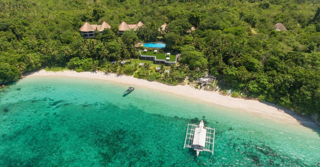 Amun Ini Beach Resort&Spa Anda  Exterior foto