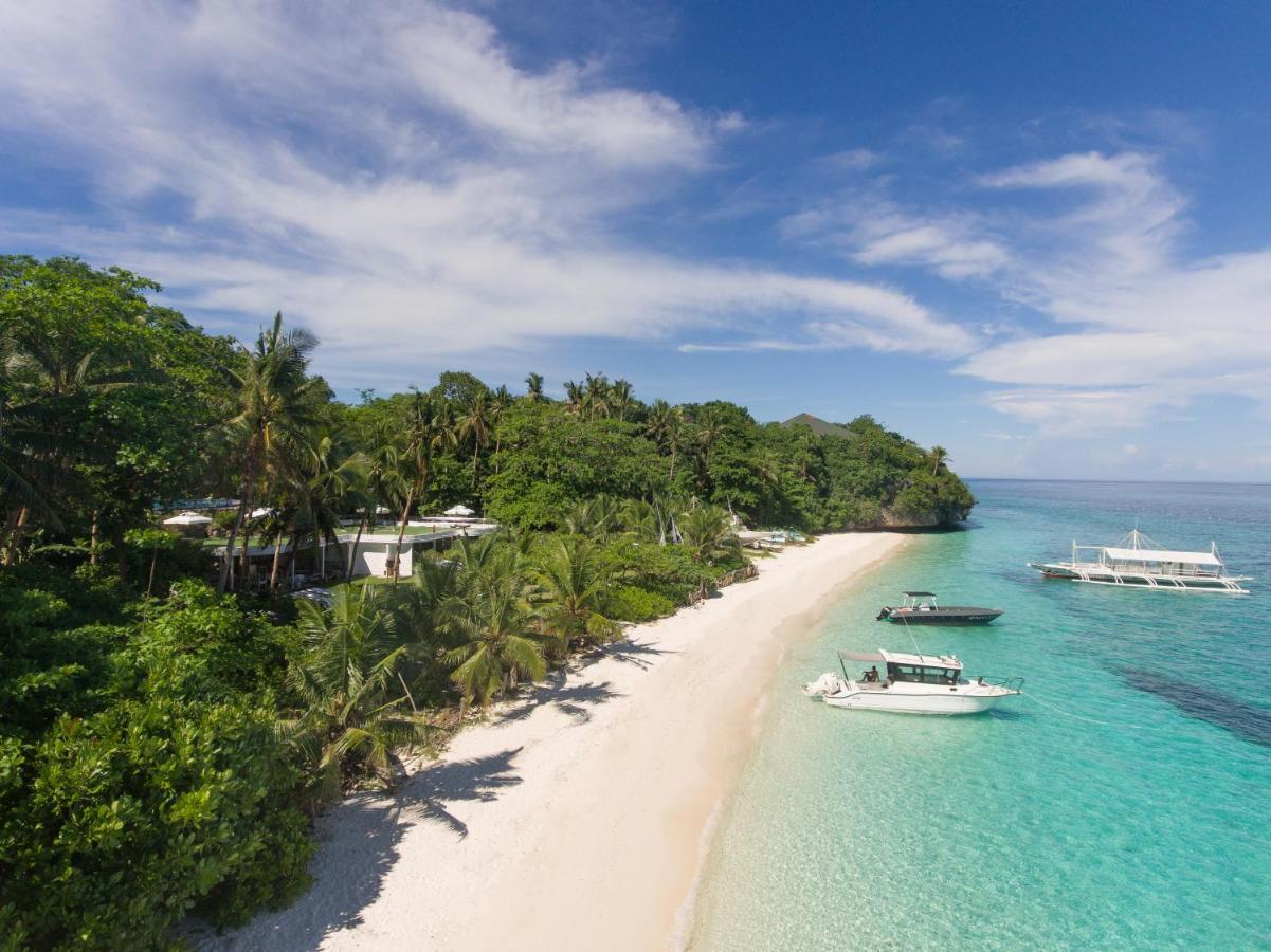 Amun Ini Beach Resort&Spa Anda  Exterior foto