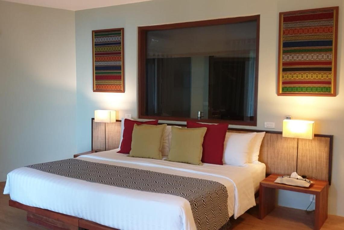 Amun Ini Beach Resort&Spa Anda  Exterior foto