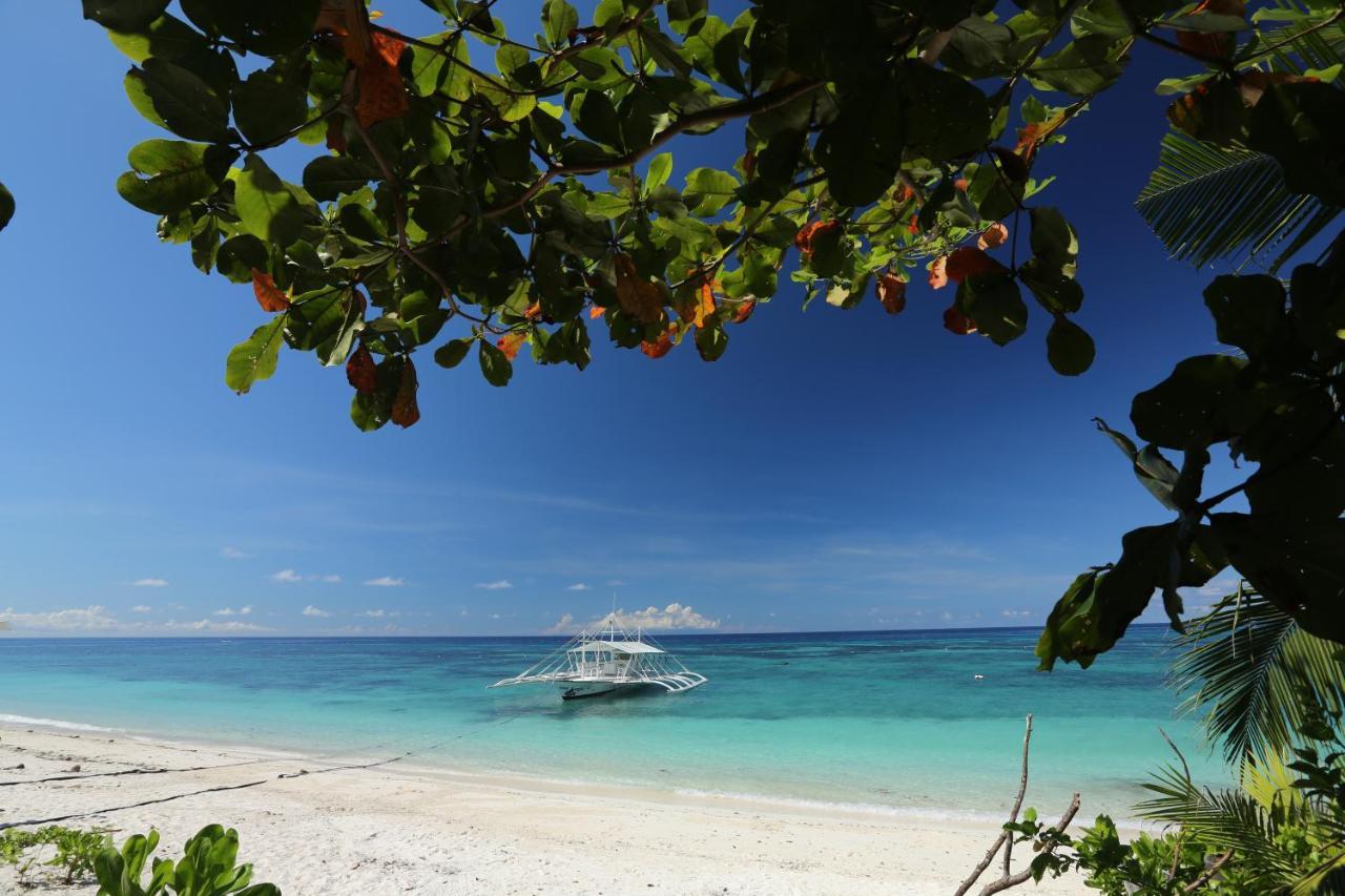 Amun Ini Beach Resort&Spa Anda  Exterior foto
